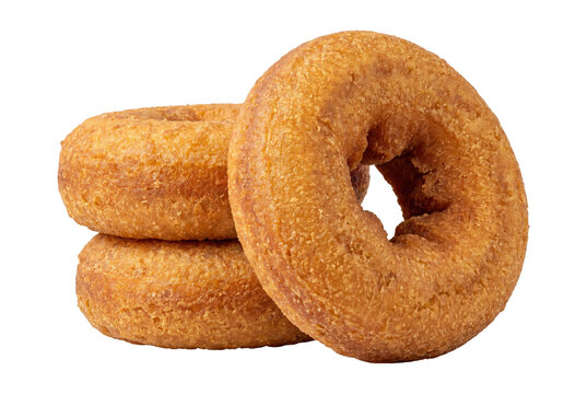 Three fresh golden brown cake donuts arranged together