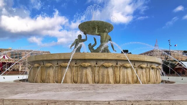 Valletta, Malta, Triton Fountain with water feature on a sunny day in Winter