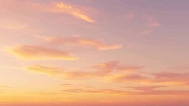 Slow motion static shot of sky and clouds drifting across coastal ocean horizon with pastel sunrise and sunset light