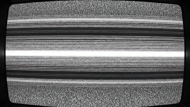 Vintage television displaying static and horizontal lines