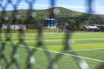 Copy space background soccer field empty public park, close up fence  © Stock fresh 