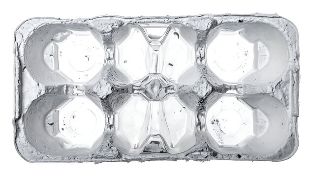 Empty six-cell molded paper pulp egg carton, top view isolated on white background with speckled texture