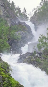 The famous Latefossen waterfall in Norway. Vertical video.