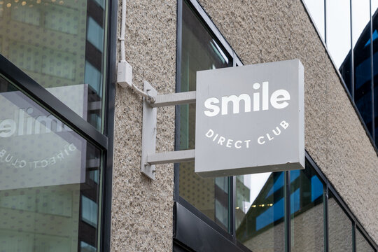 
Nashville, Tennessee, USA - December 29, 2021: Closeup of SmileDirectClub logo sign on the building. 

