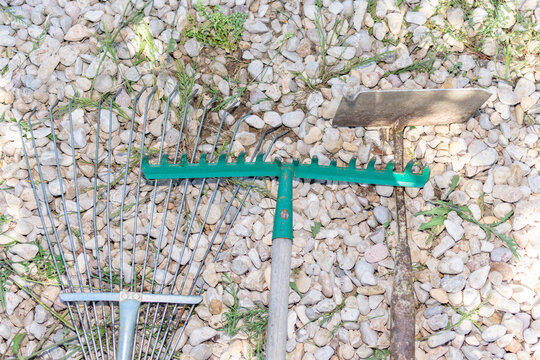 Gardening tools on stone ground outdoor close up