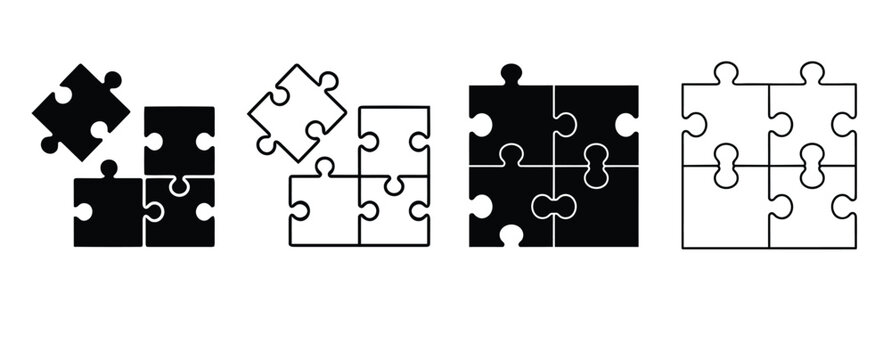Jigsaw puzzle pieces coming together in black and white