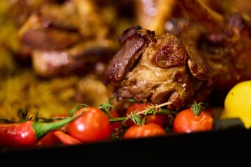 Roasted Meat with Tomatoes and Chili Peppers Close Up © Виктор Марчуков