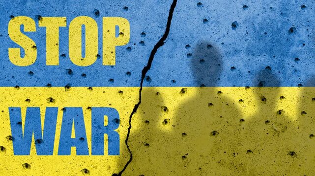 Flag of Ukraine painted on a concrete wall with word STOP WAR . Russian military aggression