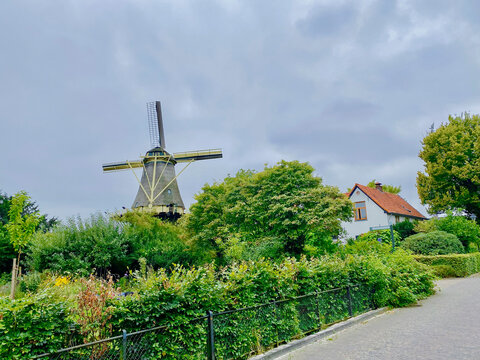 Traditional Dutch windmill in the village, Netherlands