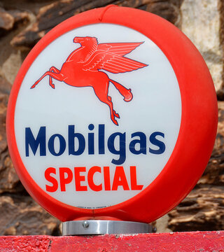 WILLIAMS ARIZONA UNITED STATES OF AMERICA: Mobilgas gas pump sign in Williams Arizona. Mobil known as the Socony Oil Company, was a major American oil company  merged with Exxon to form ExxonMobil 