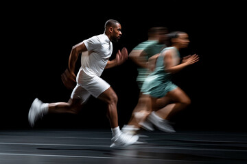 Fototapeta premium Nighttime stage performance by runners