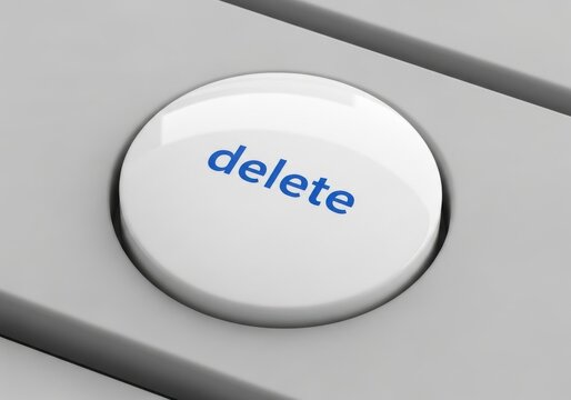 Close-up of a delete button on a computer keyboard isolated on white background