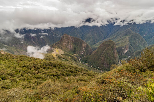 Aerial view of Machu Picchu ruins and Urubamba river valley from Machu Picchu mountain, Peru