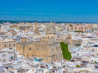 Fototapeta premium Aerial drone panorama view of Monopoli Old Town with white houses, scenic Adriatic sea coastal cityscape in Puglia, southern Italy
