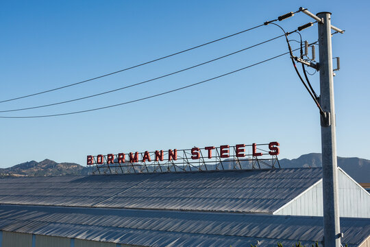 Borrmann Steels scaffold sign above a warehouse. Burbank, California, August 2020