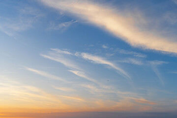 Fototapeta premium Clouds at sunset on the sky.