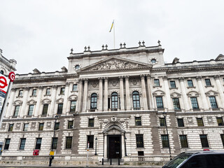 Fototapeta premium Grand neoclassical HMRC Whitehall historic building facade with columns and pediment in London, UK city center