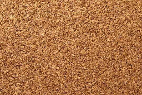 Minimal corkboard background featuring textured cork and a calm, neutral color palette