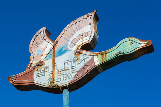 Rusted duck-shaped neon sign in San Luis Obispo, California, October 2019