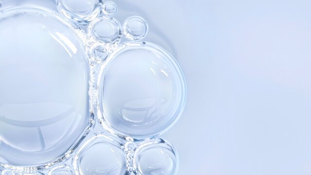 Clear liquid bubbles macro abstract water texture transparent fluid surface minimal clean background soft light close up science cosmetic serum texture.