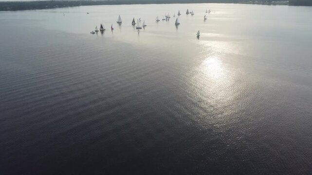 Cool drone shot flying over Palatka Fl Sailboats on the right shot 2 faster