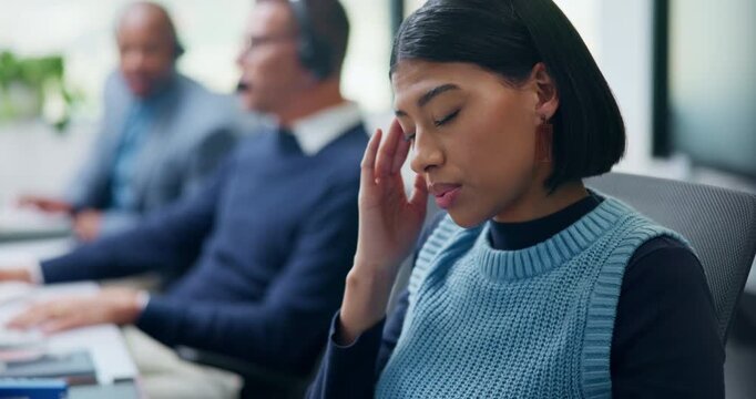 Tired, agent and woman with headache in call center, telemarketing or overwhelmed by target pressure. Overworked, telemarketer and person with fatigue on break, coworking and unhappy with burnout