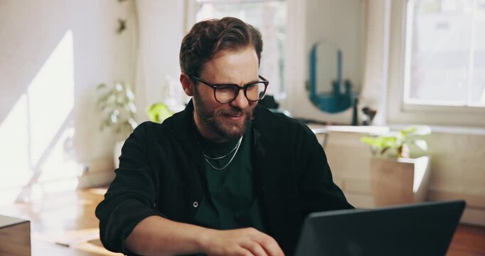 Fist pump, laptop and success with man in home for remote work goals, milestone or target. Bonus, computer and motivation with freelance employee in apartment for celebration of small business