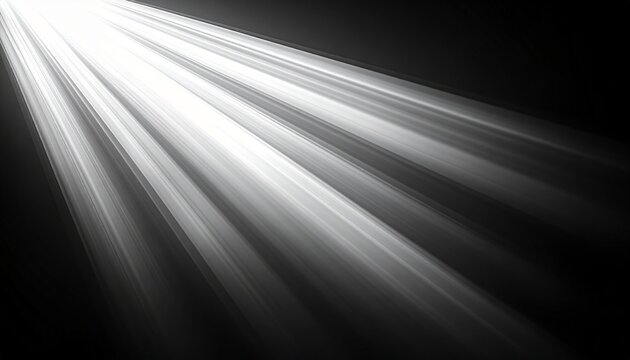 Bright white light rays shining diagonally from the top left corner onto a dark black background, creating a dramatic spotlight effect.
