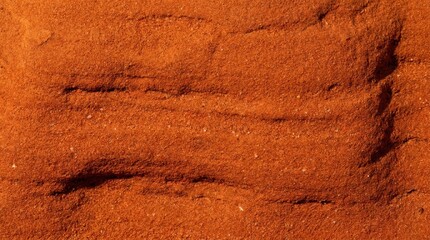 Fototapeta premium Sand Dune Texture: A close-up, macro view of a sand dune reveals intricate layers and curves sculpted by the wind, showcasing the natural beauty and texture of desert landscapes.