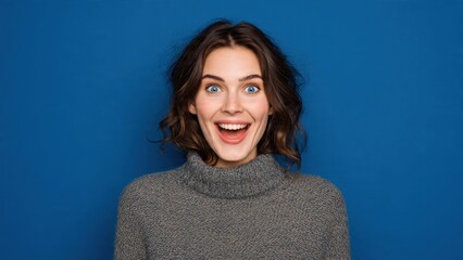 Obraz premium Excited Woman with Wide Eyes and Smile