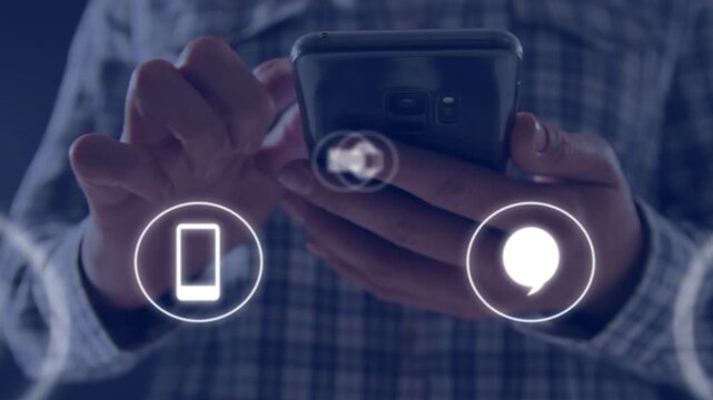 Adult male holding phone, tapping and swiping lighting app icons cycling blurring for mobile demo