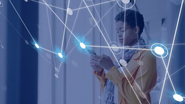 Woman tapping phone by windows, forming tech network with pulsing nodes crossing in front of her