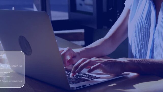 Female coder typing laptop faint code panels appearing while camera pulling back developing web app