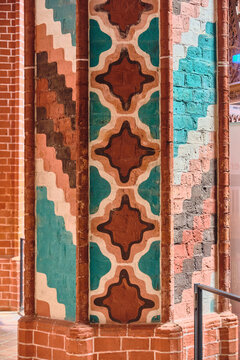 Bad Doberan, Germany - 19 July 2025: View of the ornate painted brick pillar with geometric patterns inside the Doberaner Munster.