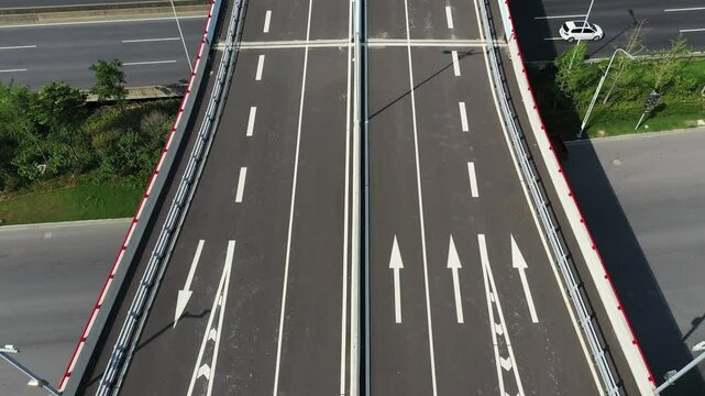 Empty Urban Highway Overpass with Lane Arrows
