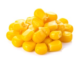 Fototapeta premium Bright Yellow Corn Kernels Piled on White Background