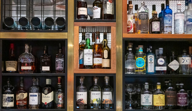 Perth, Australia - 9 April 2025: Bottle display with premium liquor bottles. Including various spirits bottles.