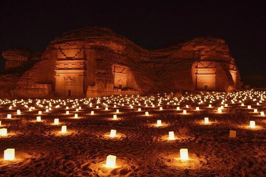 Illuminated Nabataean tombs at night, Hegra or Mada'in Salih, AlUla region, Medina province, Saudi Arabia, Arabian Peninsula