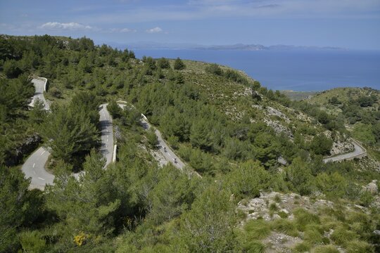 Serpentine road from Art&agrave; to the Ermita de Betlem, Parc Natural Peninsula de Llevant, near Arta, Majorca, Balearic Islands, Spain