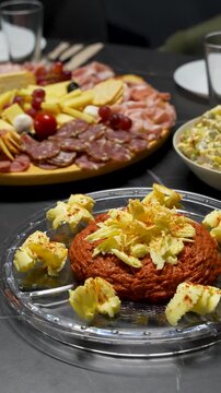 Steak Tartare finely minced raw beef cold starter cured meats and cheeses russian salad