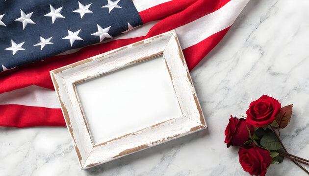 Empty picture frame with american flag and red roses on marble background