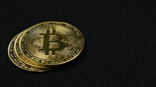Passing By Golden Bitcoins on Black