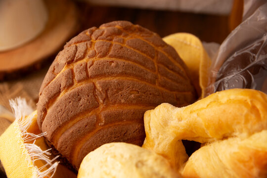 Concha bread. Mexican sweet bread roll with seashell-like appearance, Usually eaten with coffee or hot chocolate at breakfast or as an afternoon snack.