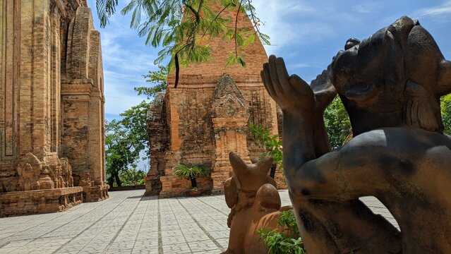 Heritage site in Nha Trang, Vietnam: Ancient Champa Kingdom's Po Nagar Towers surrounded by lush greenery