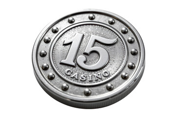 Obraz premium A metallic casino token displaying the number 15 with decorative studs and engraved details.