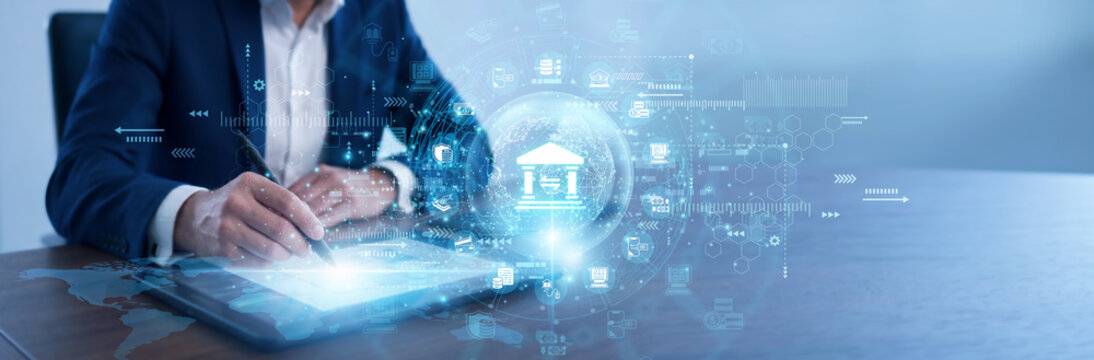 Bank manager using a tablet to review Banking transaction reports. Monitoring liquidity and client assets on the device helps maintain high security and trust for all institutional investments.