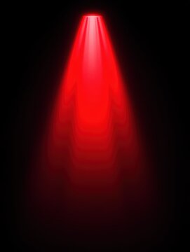 A dramatic red spotlight effect in a dark background.
