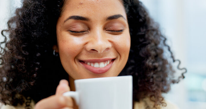 Happy, smell and woman with coffee cup in home, caffeine aroma and hot beverage for morning routine. Smile, apartment and female person with tea scent for weekend peace, energy boost and start of day