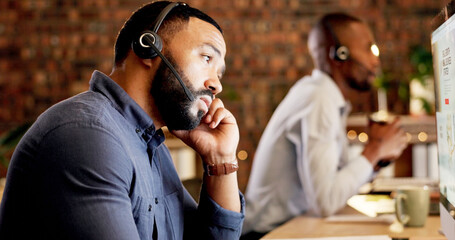 Obraz premium Tired, man and consultant with headset for fatigue, burnout or mistake in call center office. Exhausted, male person or bored agent with mic on computer for difficult tasks or coworking in workplace