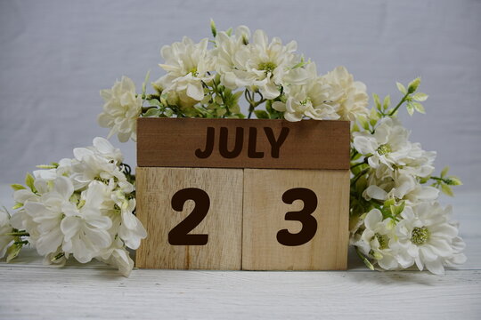 Wooden Calendar Showing the Date of July 23th. Day 23 of July month